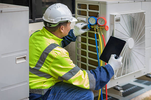 Professional Hvac technician working in Winchester, MO